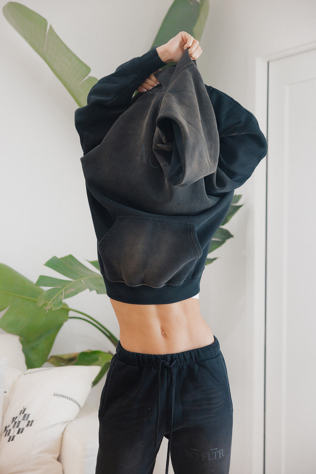 Don't talk to me hoodie in sunfaded black